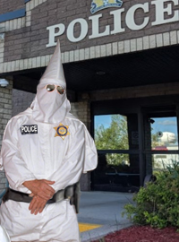 New police uniforms approved by the National Police Union will be white robes and include a new masked, pointed helmet. 