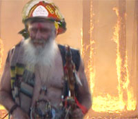 A homeless man helps put out a forest fire near Malibu.
