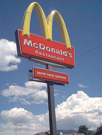 McDonalds, the world's largest fast food chain is making cut backs that will force the layoff of two employees.