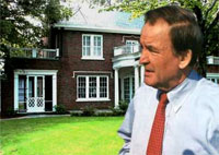 A shocked Pat Buchanan stands outside the Washington D.C. house where he and 6 others had been living as part of MTV's show "Real World: Washington D.C."