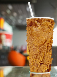 A drink cup made from fried chicken will soon be available at KFCs nationwide.