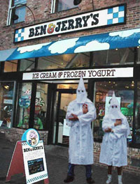 Two members of the Louisville branch of the Klu Klux Klan protest outside of a Ben and Jerry's Ice Cream shop.