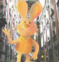 A golden statue of Peter Cottontail welcomes worshipers to the Cottonailian temple in Leeds. 